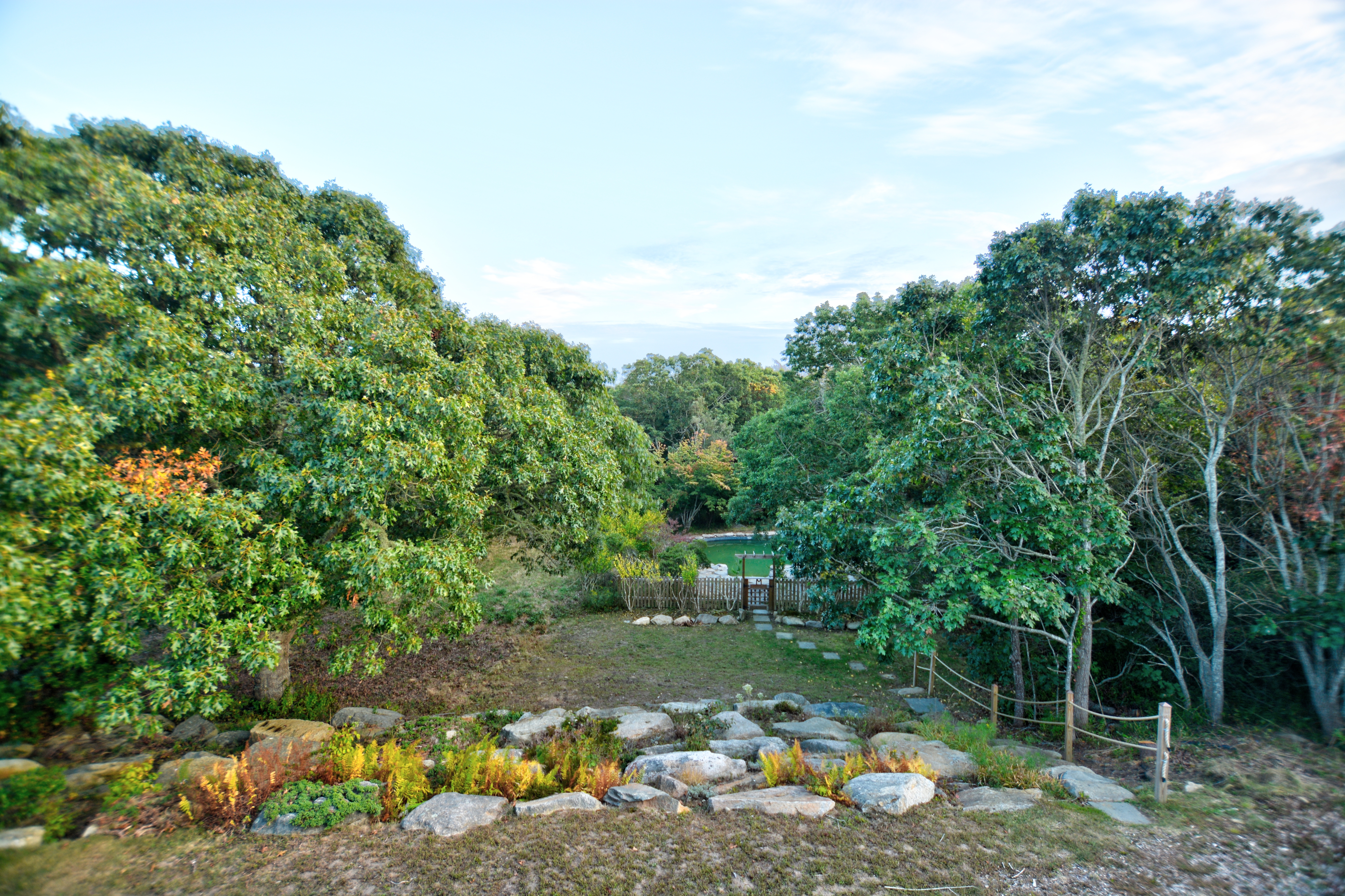 13 Kapigan Road Chilmark, MA 02535 - Photo 16 of 25 a backyard of a house with lots of green space