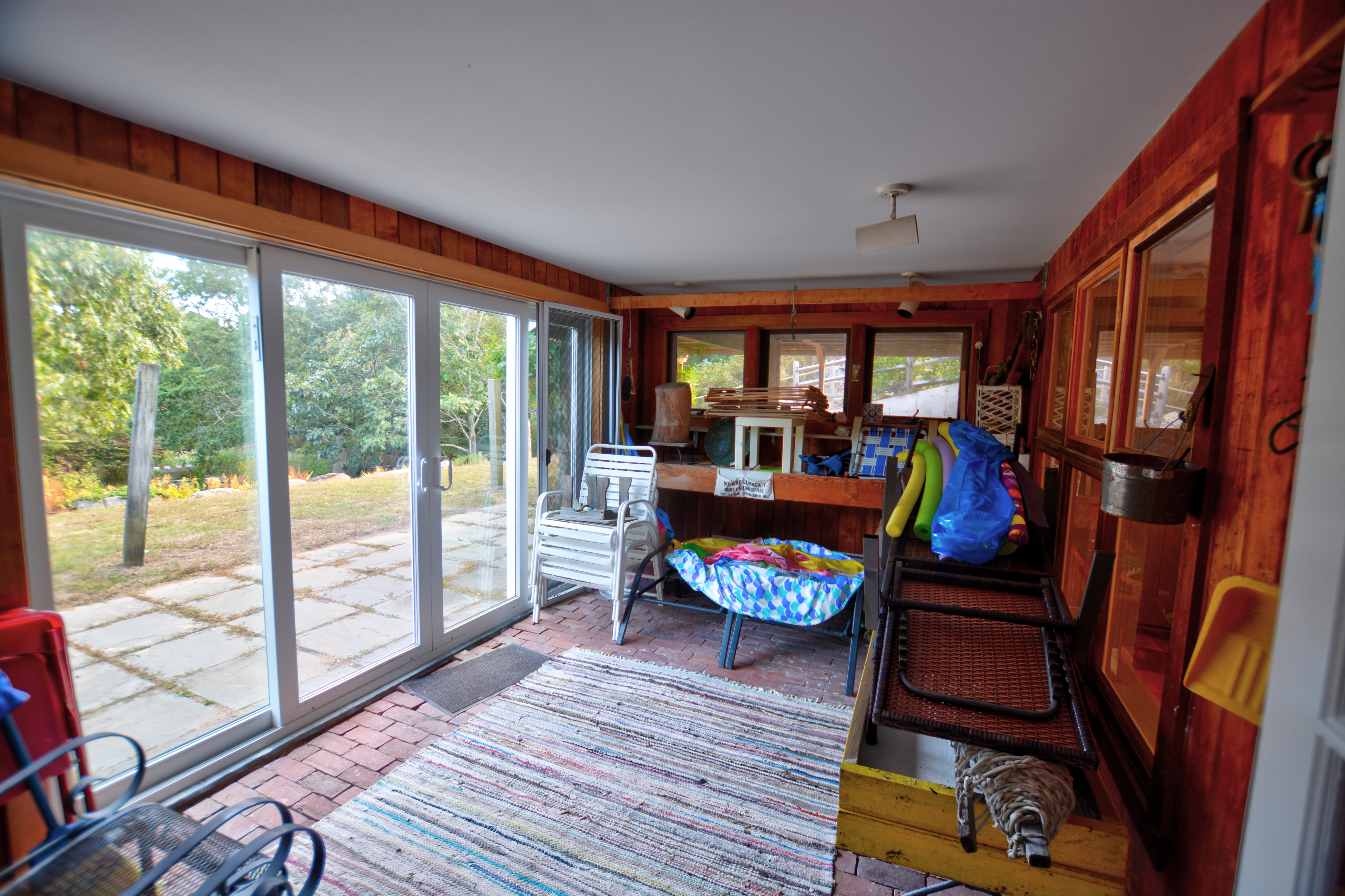 13 Kapigan Road Chilmark, MA 02535 - Photo 22 of 25 a living room with furniture and a large window
