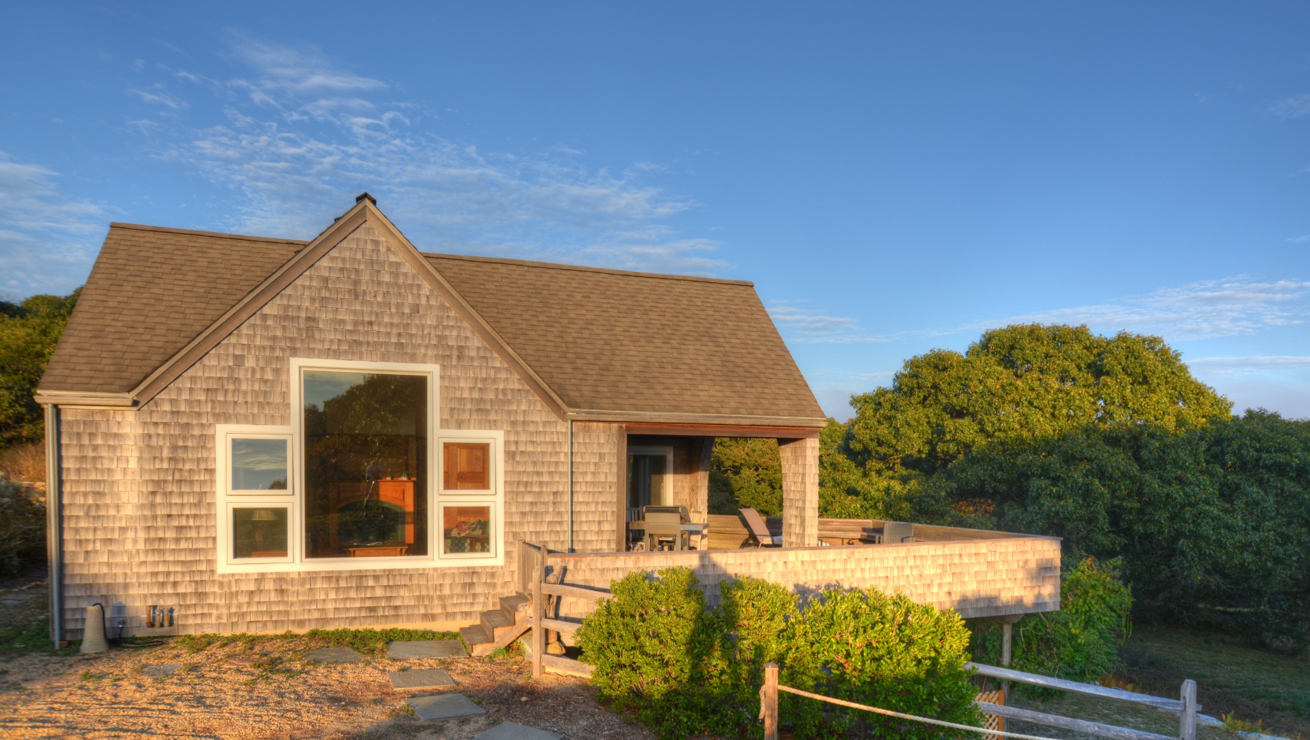 13 Kapigan Road Chilmark, MA 02535 - Photo 4 of 25 a front view of a house with yard