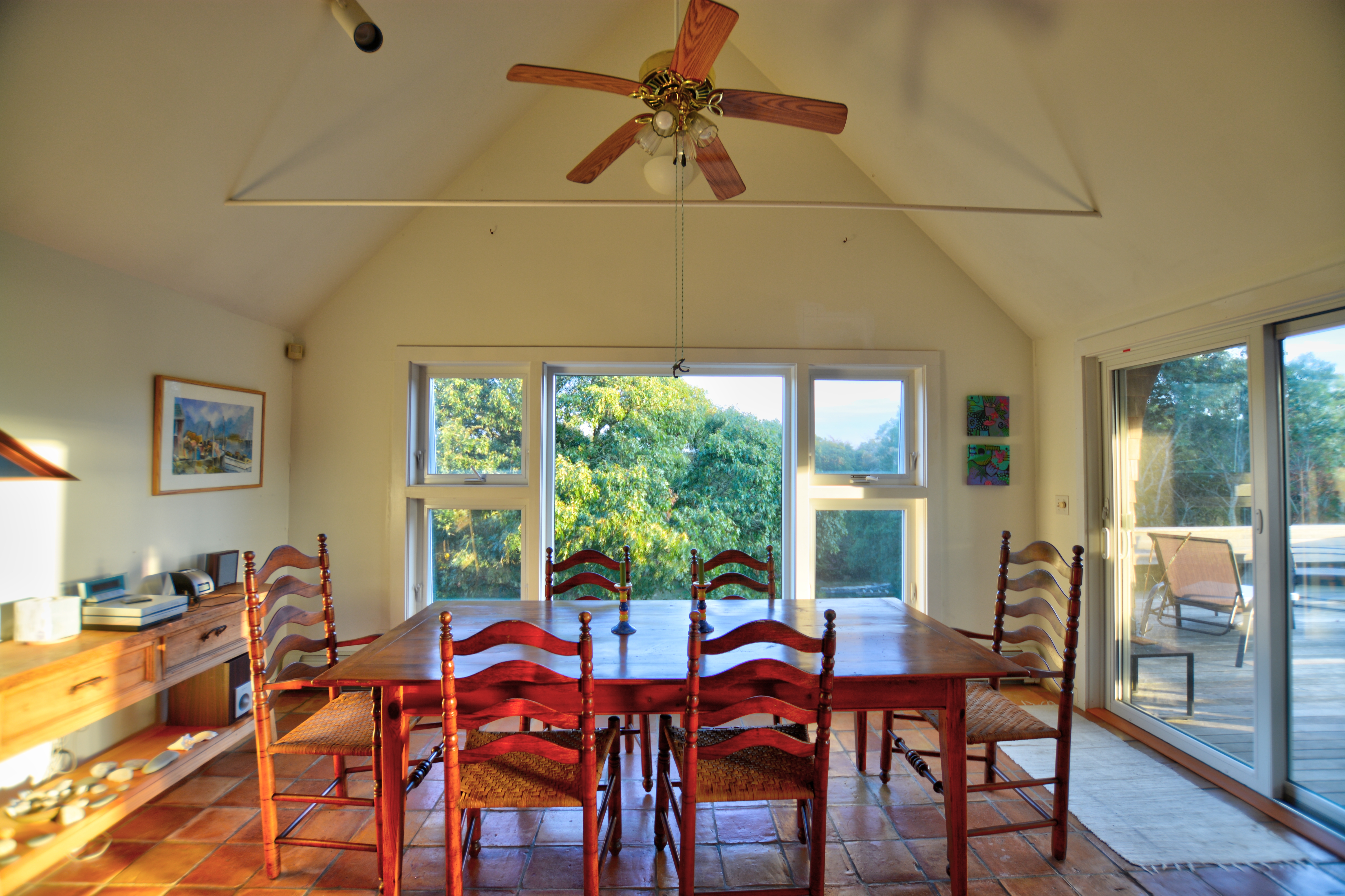 13 Kapigan Road Chilmark, MA 02535 - Photo 5 of 25 a view of a dining room with furniture window and outside view