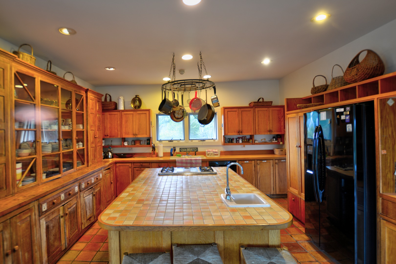13 Kapigan Road Chilmark, MA 02535 - Photo 7 of 25 a large kitchen with lots of counter space and windows