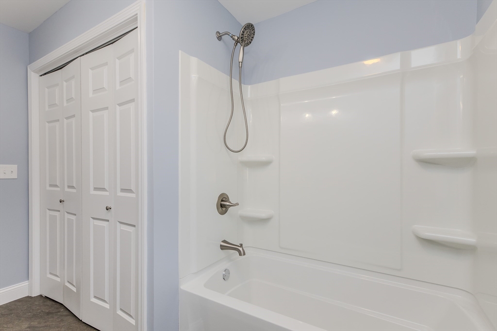 132 Kibbe Road East Longmeadow, MA 01028 - Photo 27 of 32 a bathroom with a bathtub and shower