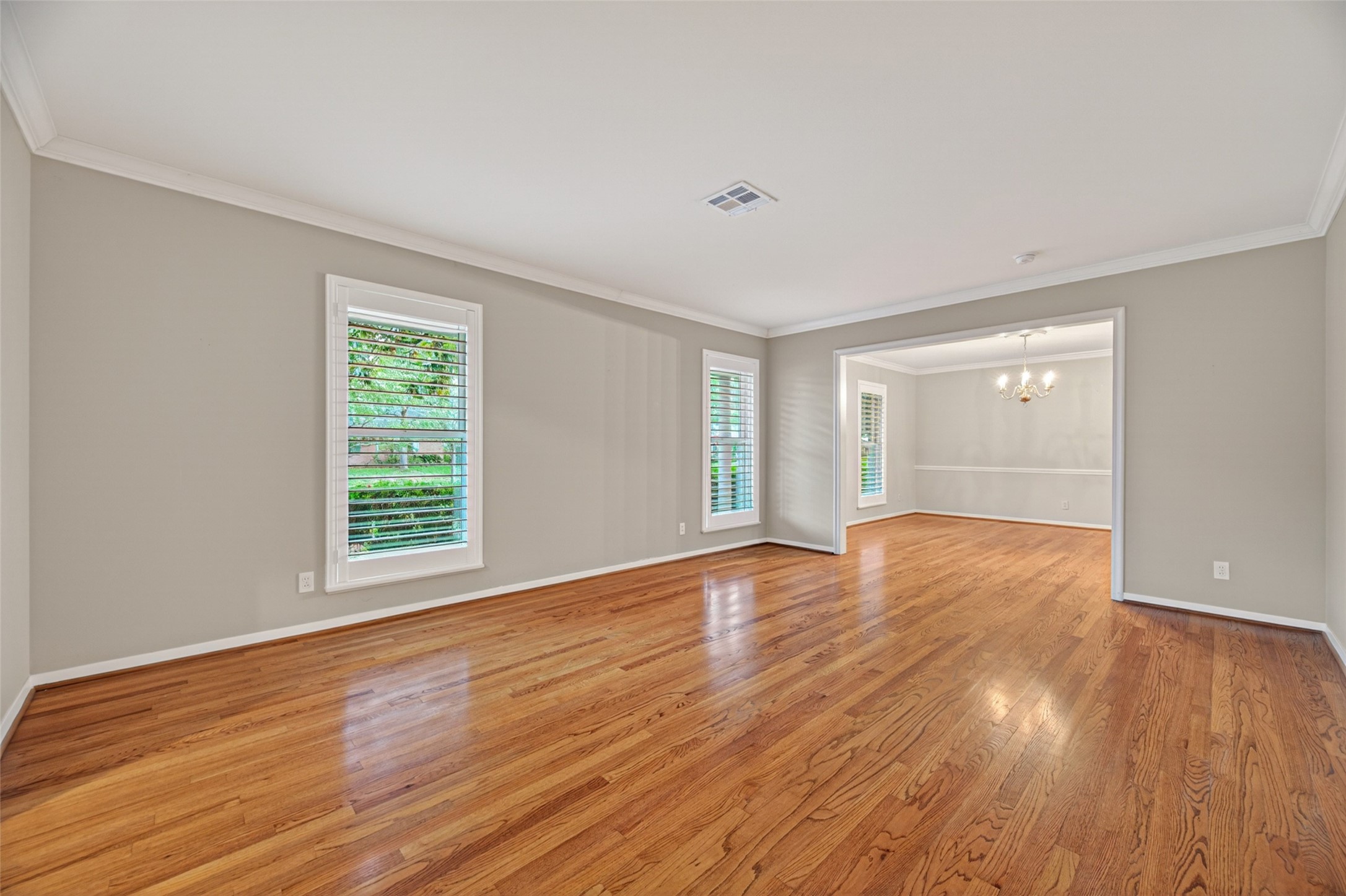 5638 Sanford Road Houston, TX 77096 - Photo 9 of 41 Timeless original hardwood floors flow throughout the home, while the spacious formal living room overlooks the front yard and front patio.