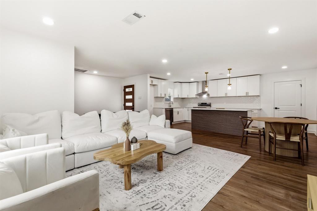 544 West Bethel Road Coppell, TX 75019 - Photo 7 of 19 a living room with furniture and kitchen view