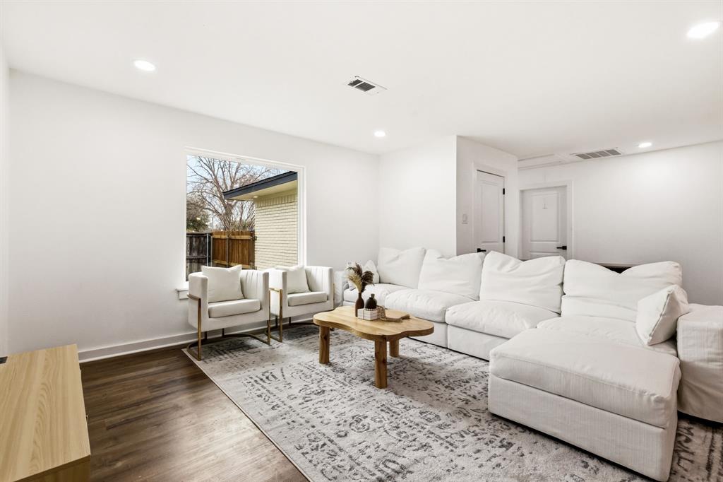 544 West Bethel Road Coppell, TX 75019 - Photo 9 of 19 a living room with furniture and wooden floor