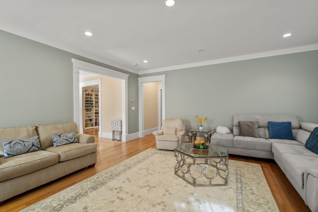 1682 Commonwealth Avenue Newton, MA 02465 - Photo 8 of 35 a living room with furniture and a couch