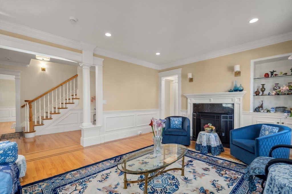 1682 Commonwealth Avenue Newton, MA 02465 - Photo 10 of 35 a living room with furniture fireplace and rug