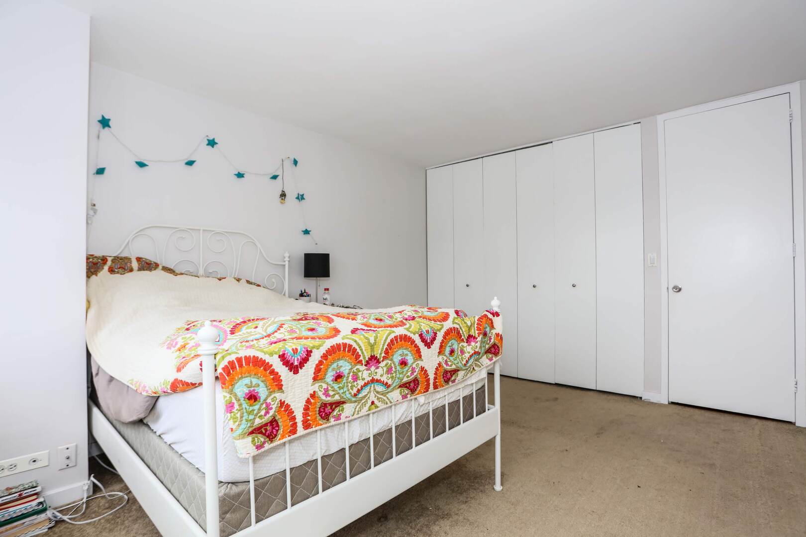 655 West Irving Park Road, Unit 1017 Chicago, IL 60613 - Photo 15 of 24 a bedroom with a bed and a window