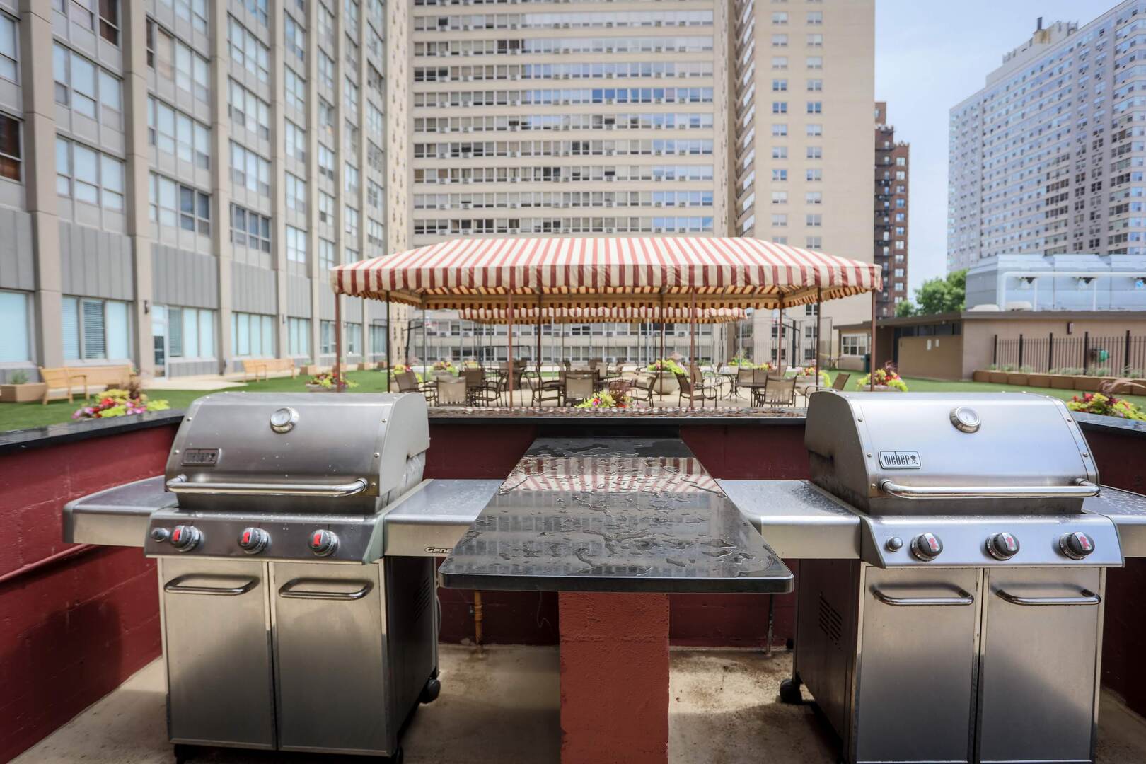 655 West Irving Park Road, Unit 1017 Chicago, IL 60613 - Photo 18 of 24 a bed sitting in a bedroom next to a window