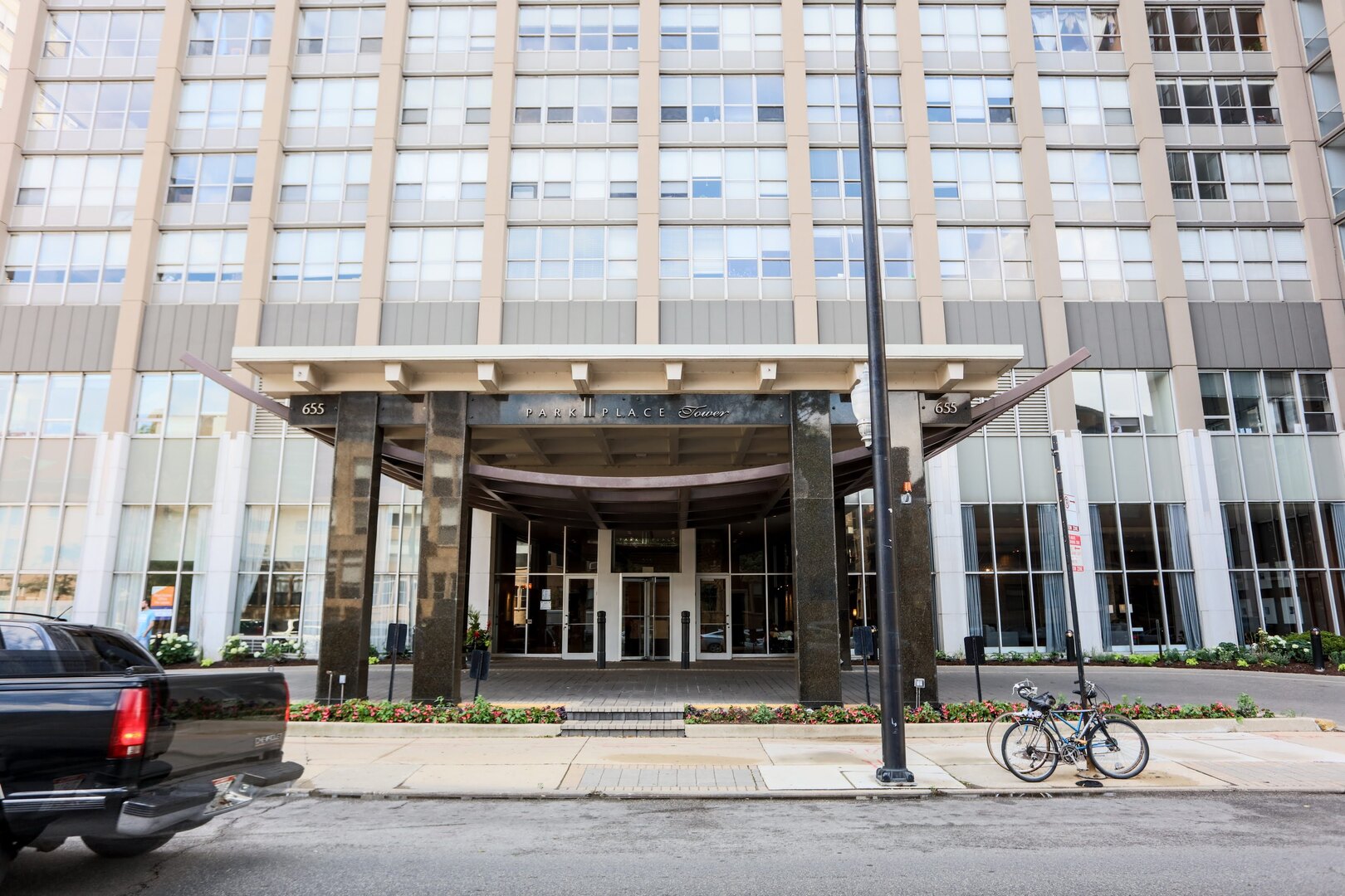 655 West Irving Park Road, Unit 1017 Chicago, IL 60613 - Photo 2 of 24 a view of a brick building and a large window
