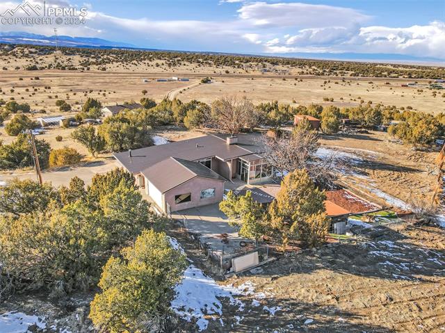 5835 Verde Road Pueblo, CO 81004 - Photo 47 of 50 Drone / aerial view featuring a mountain view