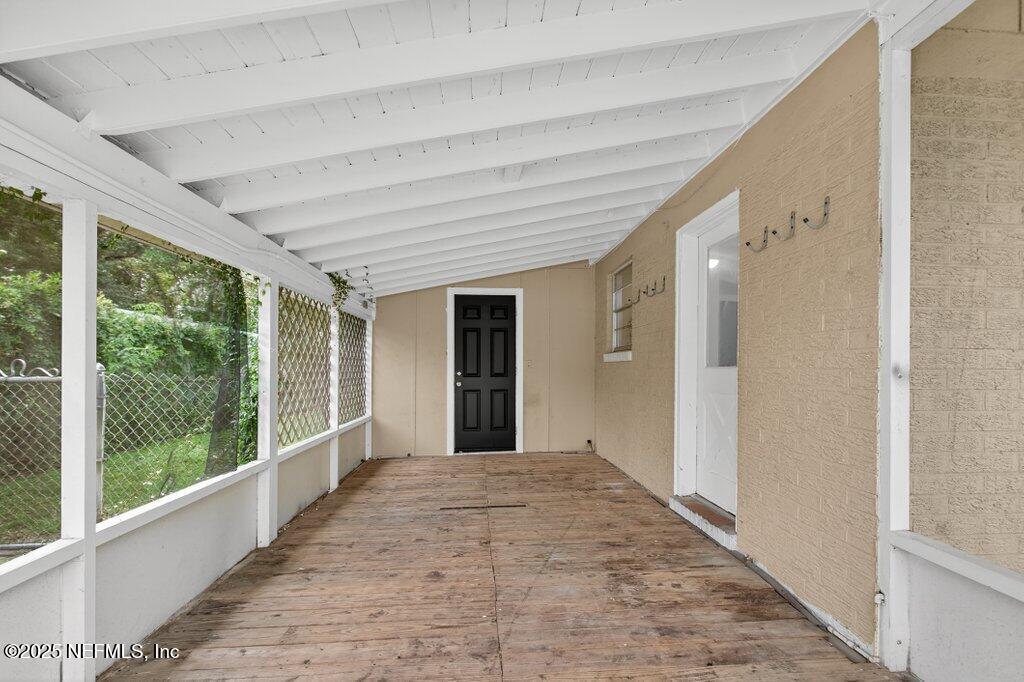 7326 Melvin Road Jacksonville, FL 32210 - Photo 27 of 42 a view of a porch