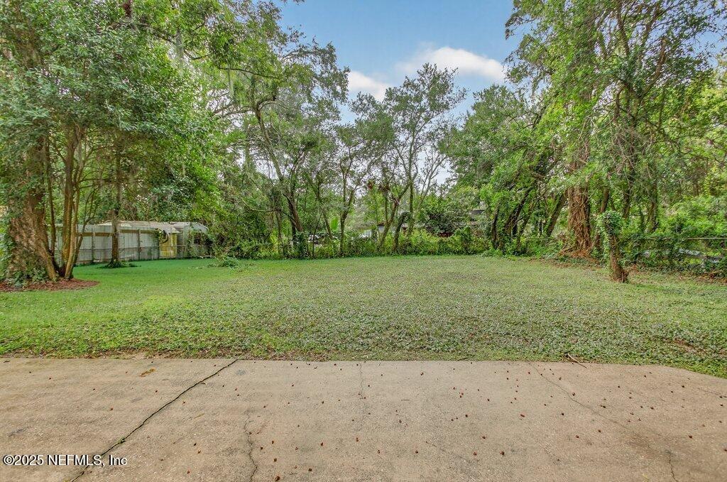 7326 Melvin Road Jacksonville, FL 32210 - Photo 38 of 42 a view of a park with large trees