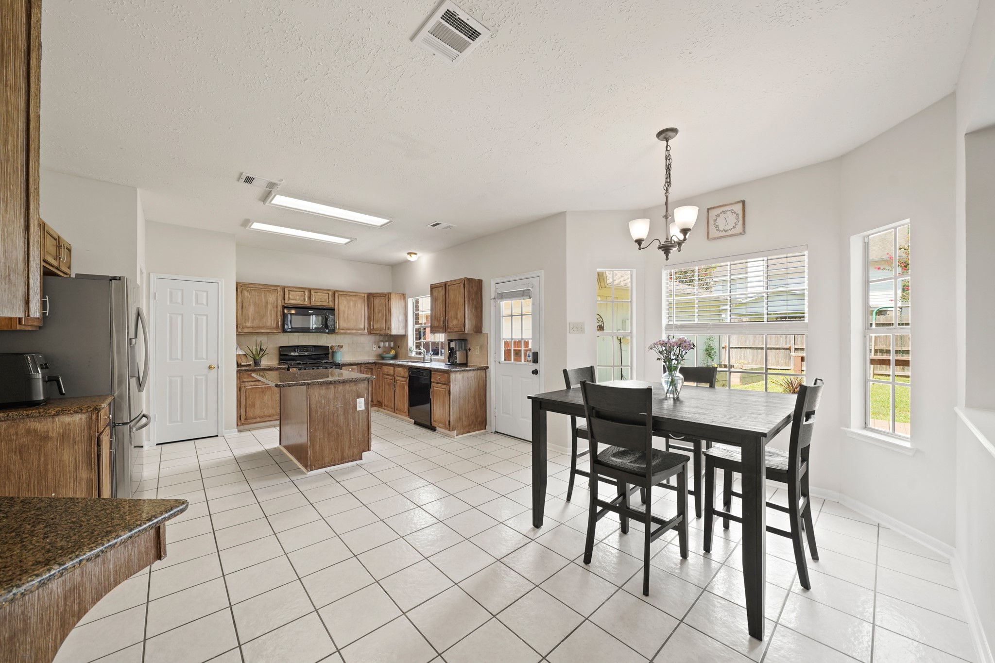 16114 Kintyre Point Road Houston, TX 77095 - Photo 14 of 39 The Breakfast Room is large and has a built-in desk.