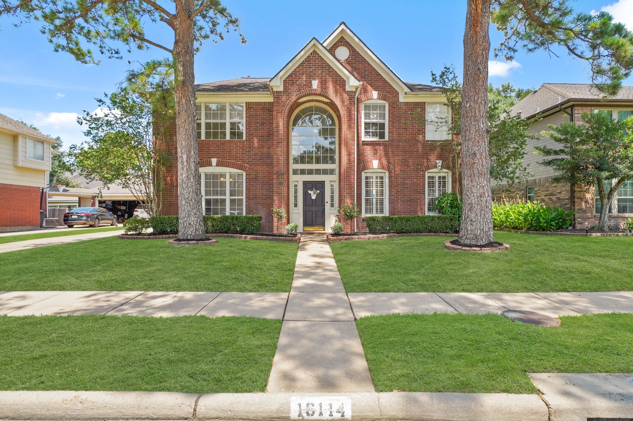 16114 Kintyre Point Road Houston, TX 77095 - Photo 2 of 39 Framed by beautiful trees, this home is ready for new owners