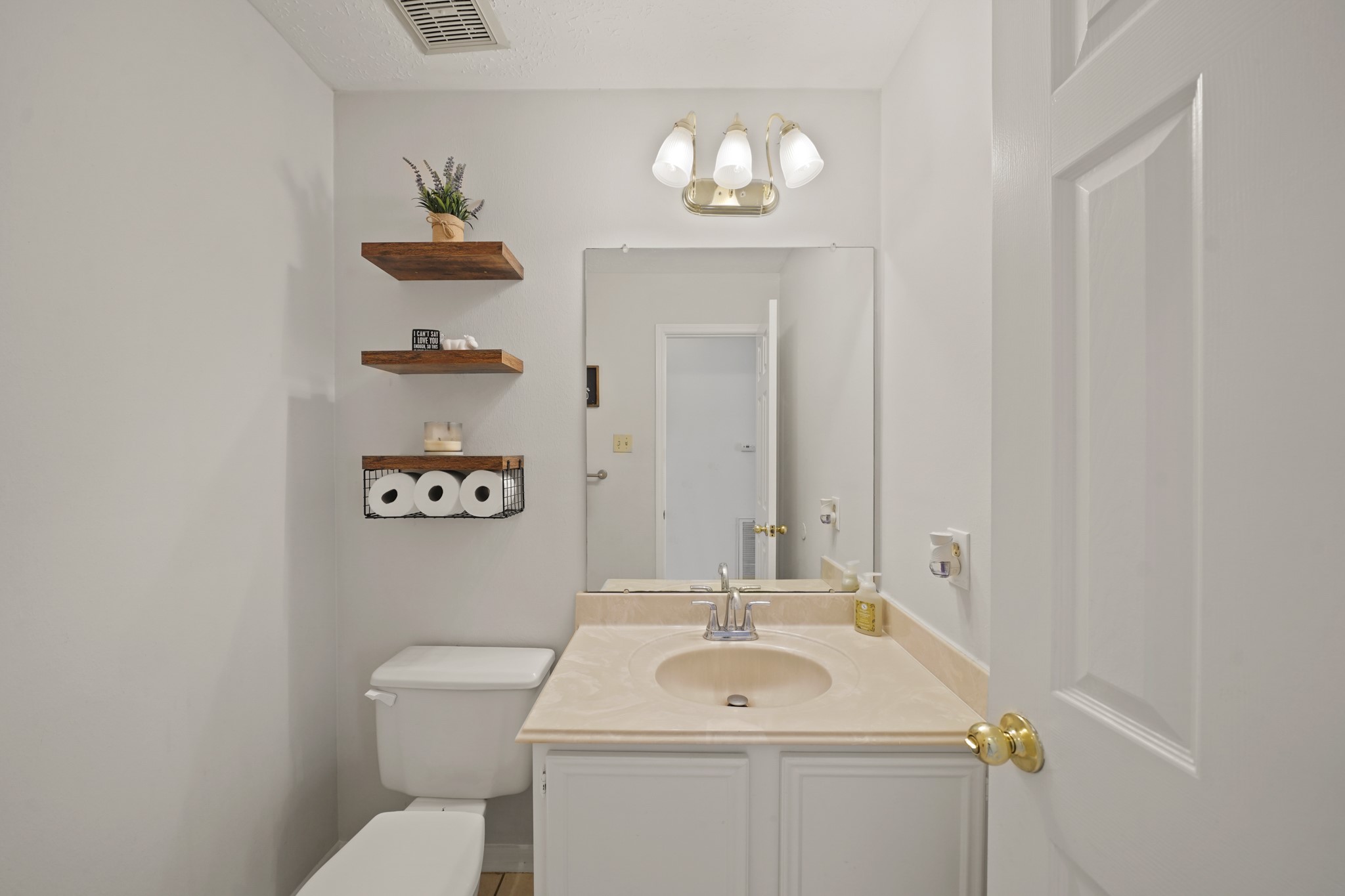 16114 Kintyre Point Road Houston, TX 77095 - Photo 20 of 39 The half bath is located in the hallway leading from the kitchen to the dining room.