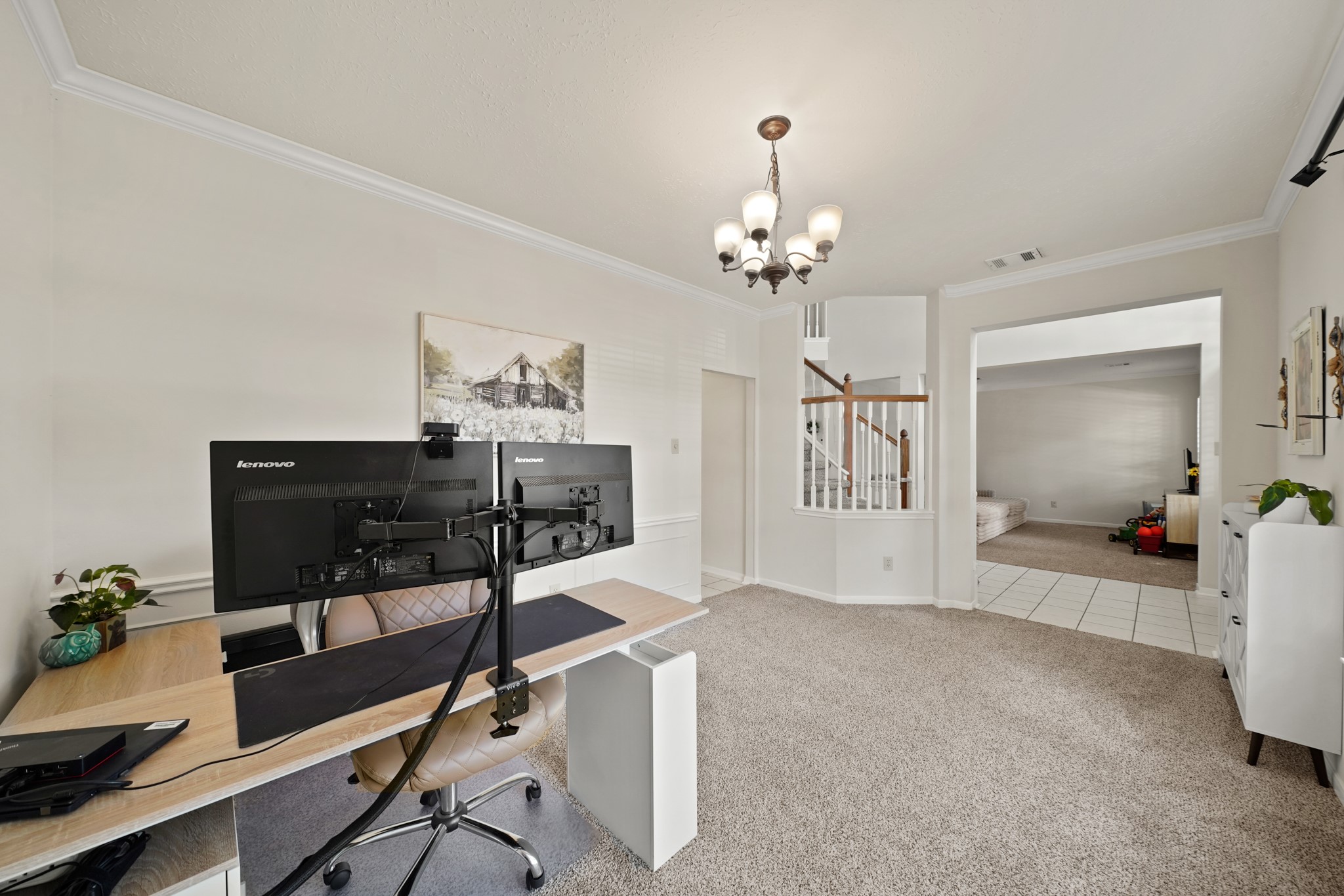 16114 Kintyre Point Road Houston, TX 77095 - Photo 10 of 39 The Dining Room has wainscoting and crown molding.