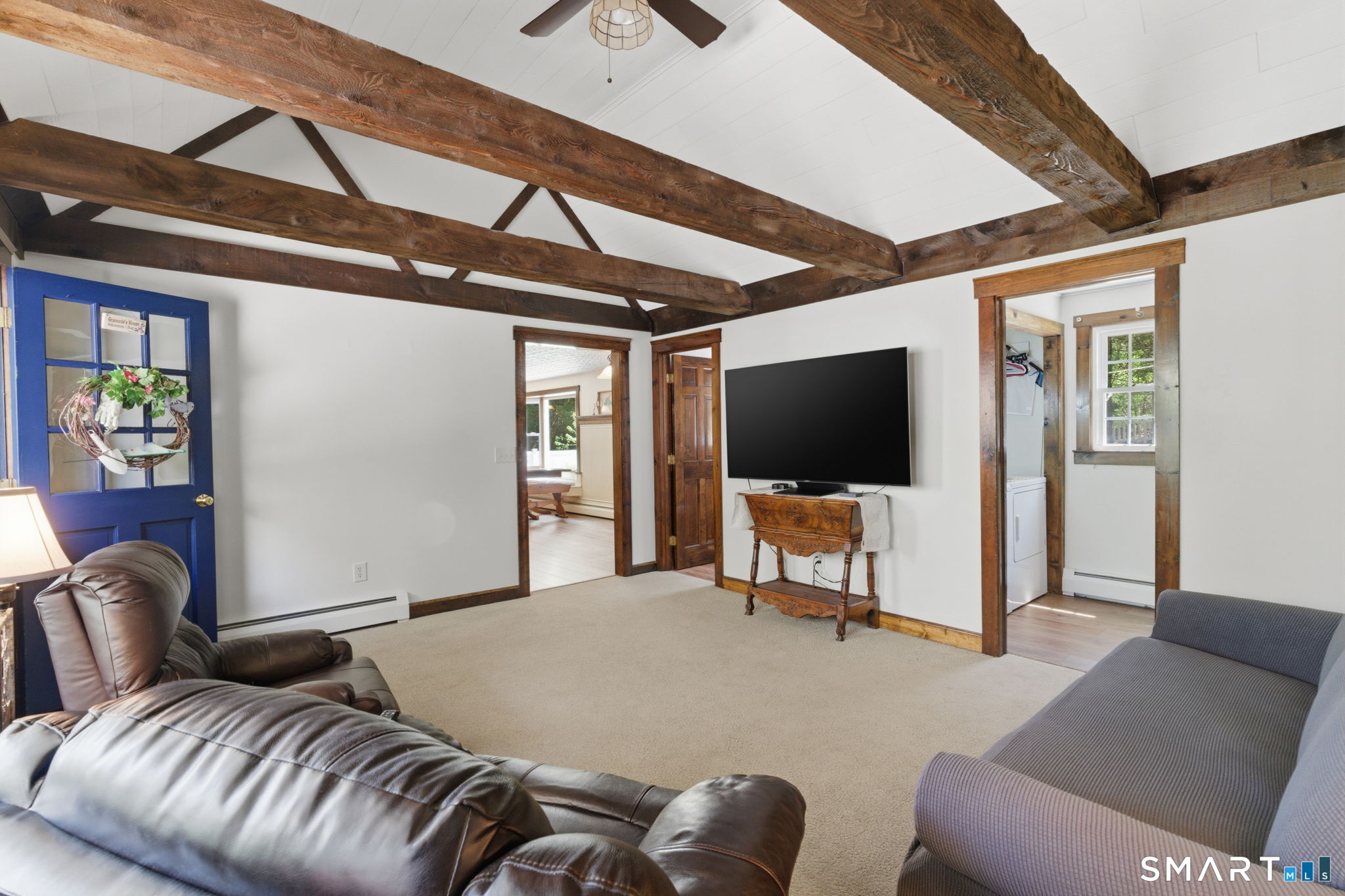 79 Buckboard Lane Bristol, CT 06010 - Photo 23 of 40 a living room with furniture and a flat screen tv