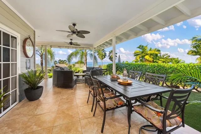 a outdoor dining space with furniture and outdoor view