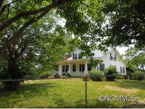 140 Hall Road Rutherfordton, NC 28139 - Photo 1 of 24 a front view of a house with a yard
