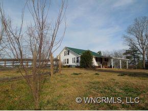 140 Hall Road Rutherfordton, NC 28139 - Photo 20 of 24 a view of a house with a yard