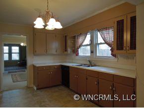 140 Hall Road Rutherfordton, NC 28139 - Photo 5 of 24 a bathroom with a sink and a large mirror