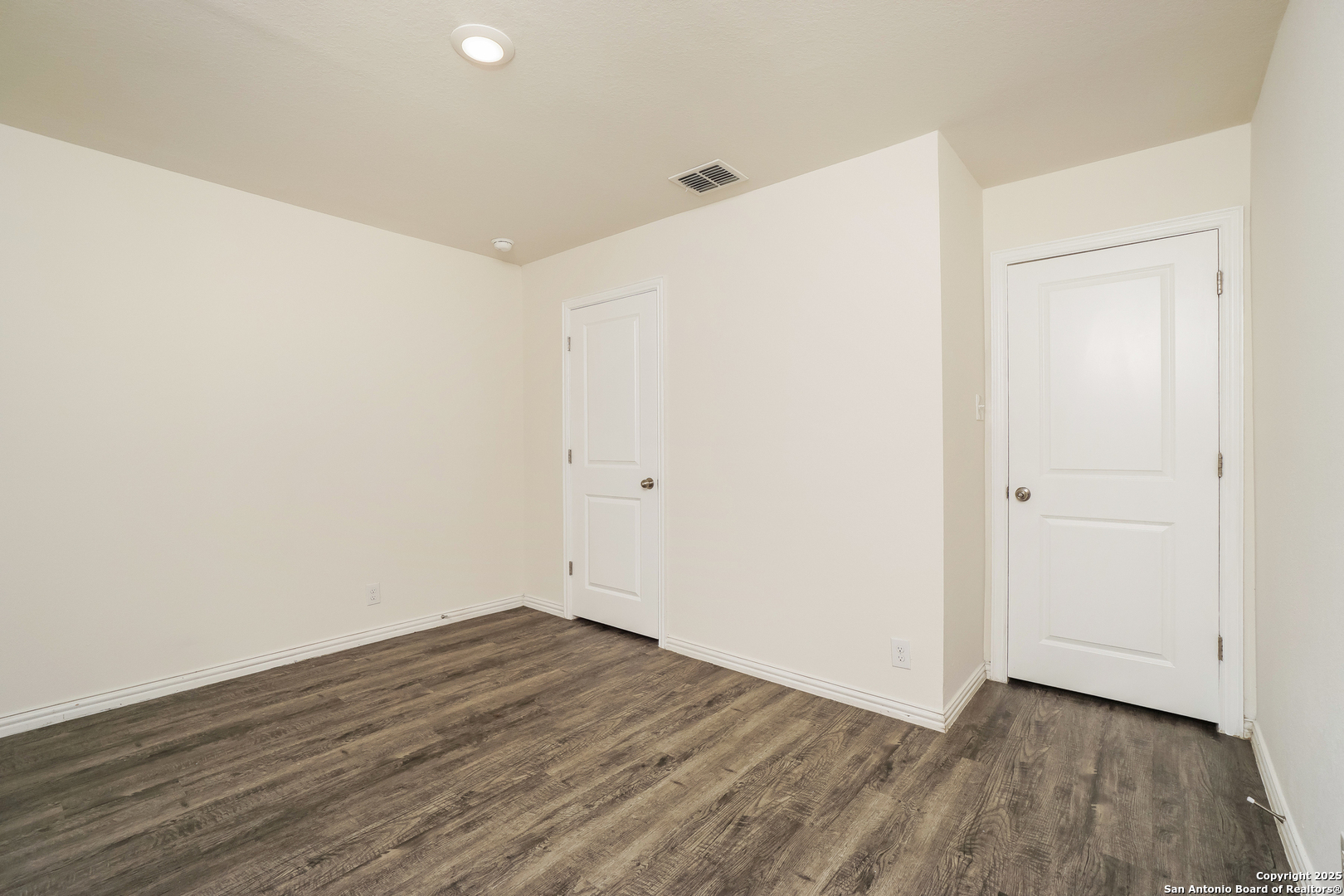 5334 Natho Street San Antonio, TX 78222 - Photo 16 of 21 a view of an empty room with wooden floor