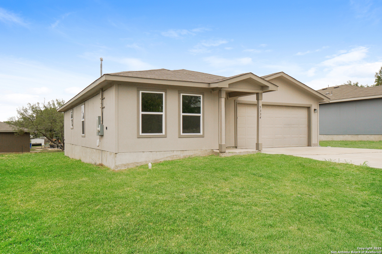 5334 Natho Street San Antonio, TX 78222 - Photo 2 of 21 a view of a back yard of the house