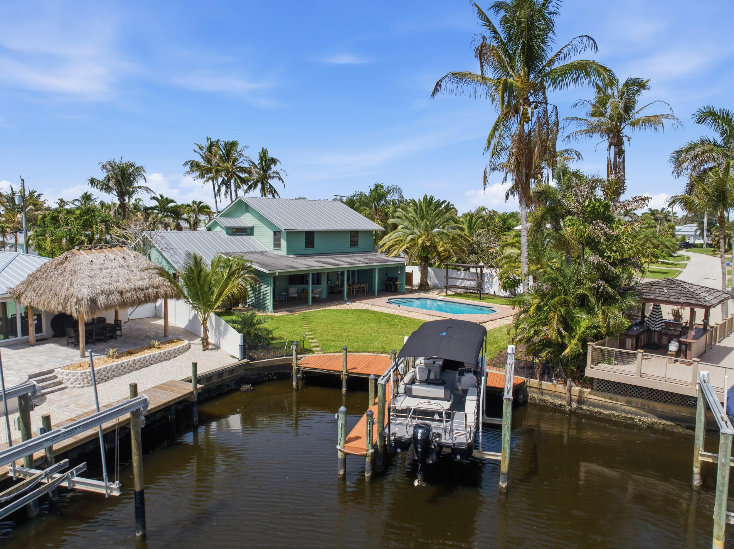 1489 Southwest Seahawk Way Palm City, FL 34990 - Photo 5 of 57 54_dji_20260708111455_0985_d