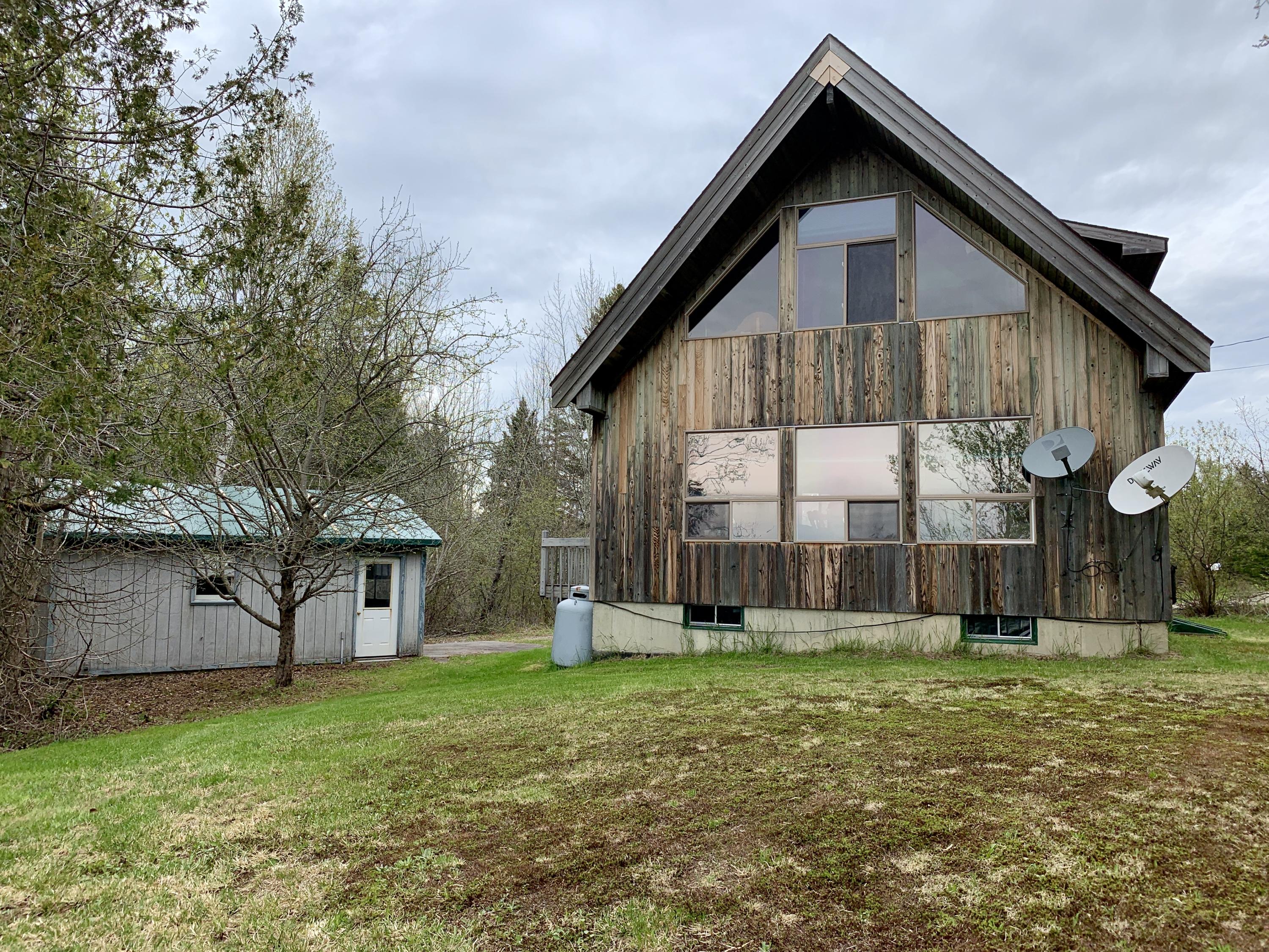 43 Leach Point Road Perry, ME 04667 - Photo 1 of 29 house & garage from water
