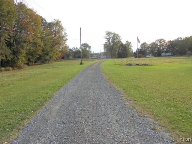 1448 Church Road Wind Gap, PA 18091 - Photo 7 of 31 a view of a field with trees in the background