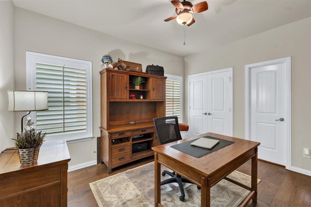 1701 Meadow Ranch Road McKinney, TX 75071 - Photo 7 of 40 a living room with furniture and a wooden floor