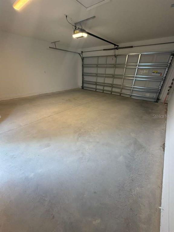 4617 Orchard View Alley Winter Garden, FL 34787 - Photo 28 of 32 a view of an empty garage