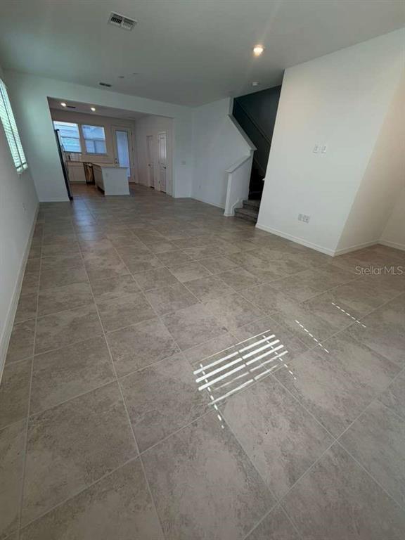 4617 Orchard View Alley Winter Garden, FL 34787 - Photo 5 of 32 a view of an empty room with a window