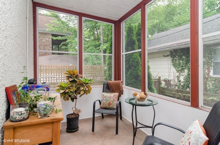 2022 Colfax Street, Unit 1 Evanston, IL 60201 - Photo 7 of 10 a living room filled with furniture and a potted plant
