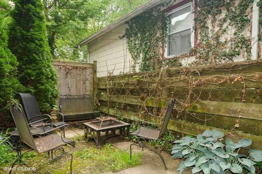 2022 Colfax Street, Unit 1 Evanston, IL 60201 - Photo 10 of 10 a backyard of a house with table and chairs