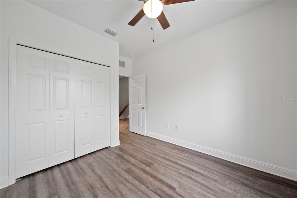 558 Harbor Ridge Drive Palm Harbor, FL 34683 - Photo 15 of 27 wooden floor in an empty room