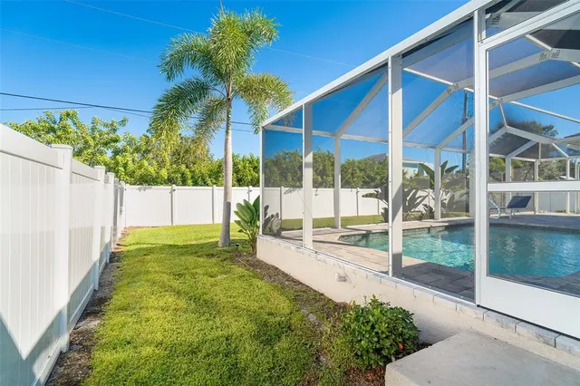 a view of a backyard with patio
