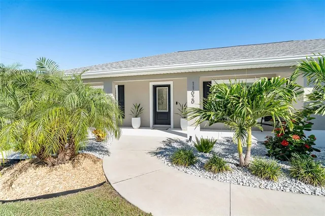 a view of a garden with potted plants