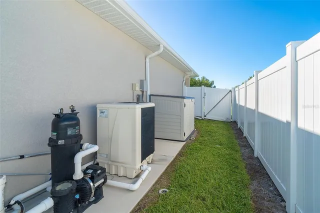 a view of swimming pool with outdoor seating