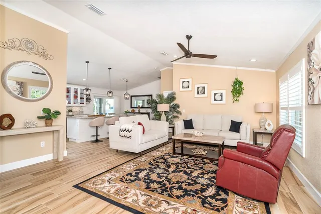 a living room with furniture and a table