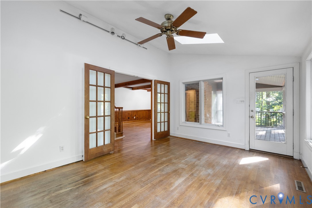 8939 Cardiff Road North Chesterfield, VA 23236 - Photo 15 of 45 Unfurnished room featuring lofted ceiling, light w