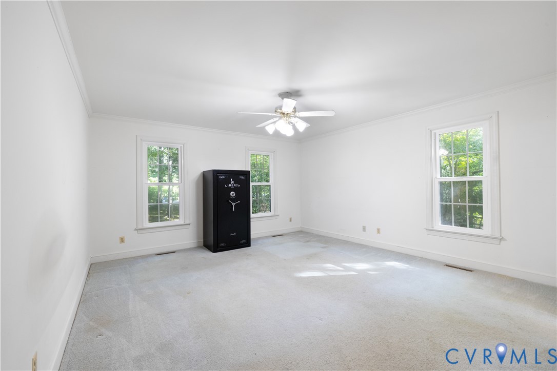 8939 Cardiff Road North Chesterfield, VA 23236 - Photo 17 of 45 Unfurnished room featuring carpet flooring, crown