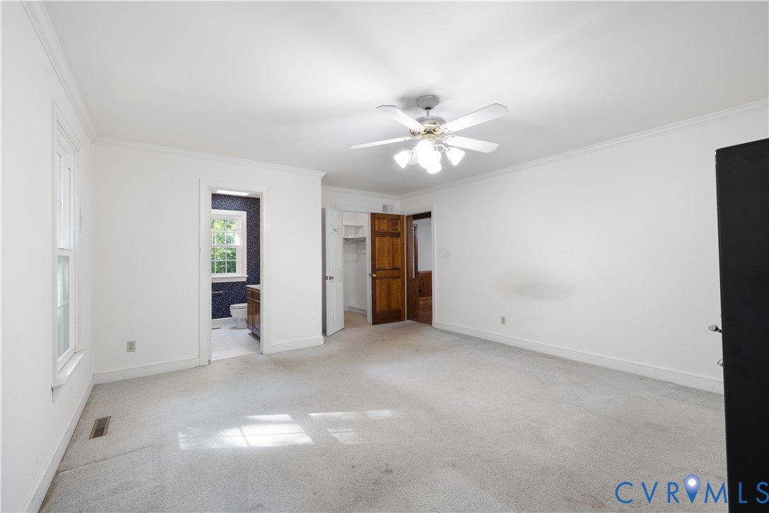 8939 Cardiff Road North Chesterfield, VA 23236 - Photo 18 of 45 Unfurnished bedroom with crown molding, light carp