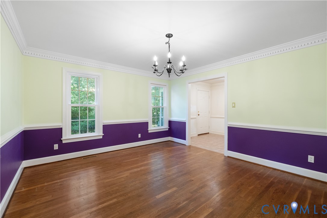 8939 Cardiff Road North Chesterfield, VA 23236 - Photo 22 of 45 Unfurnished dining area featuring crown molding, a