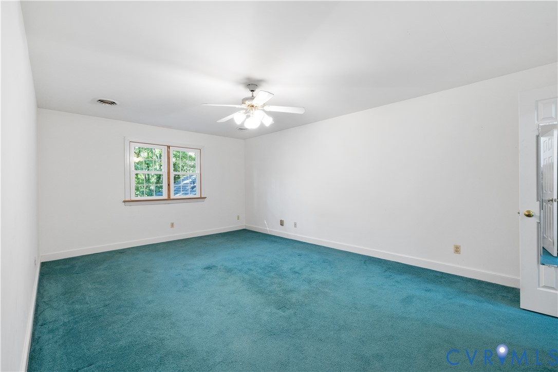 8939 Cardiff Road North Chesterfield, VA 23236 - Photo 23 of 45 Unfurnished room with dark carpet and ceiling fan