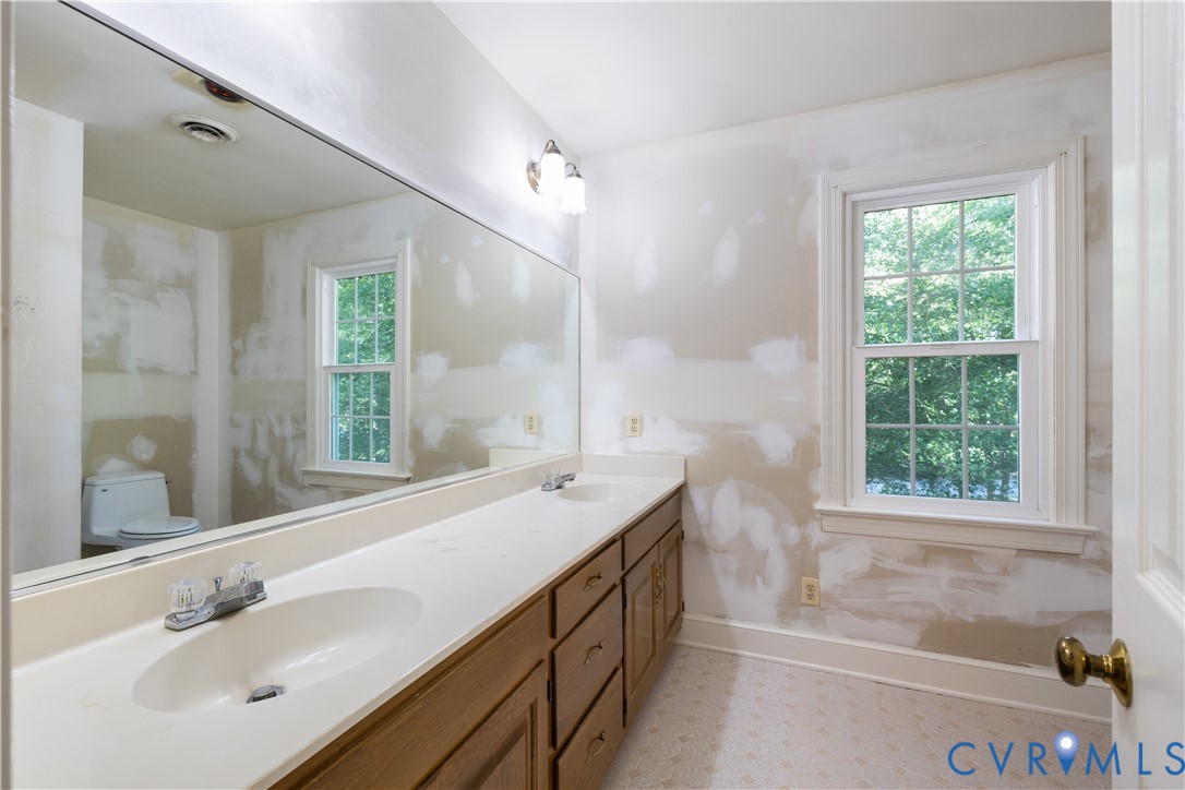 8939 Cardiff Road North Chesterfield, VA 23236 - Photo 26 of 45 Full bath with toilet and double vanity