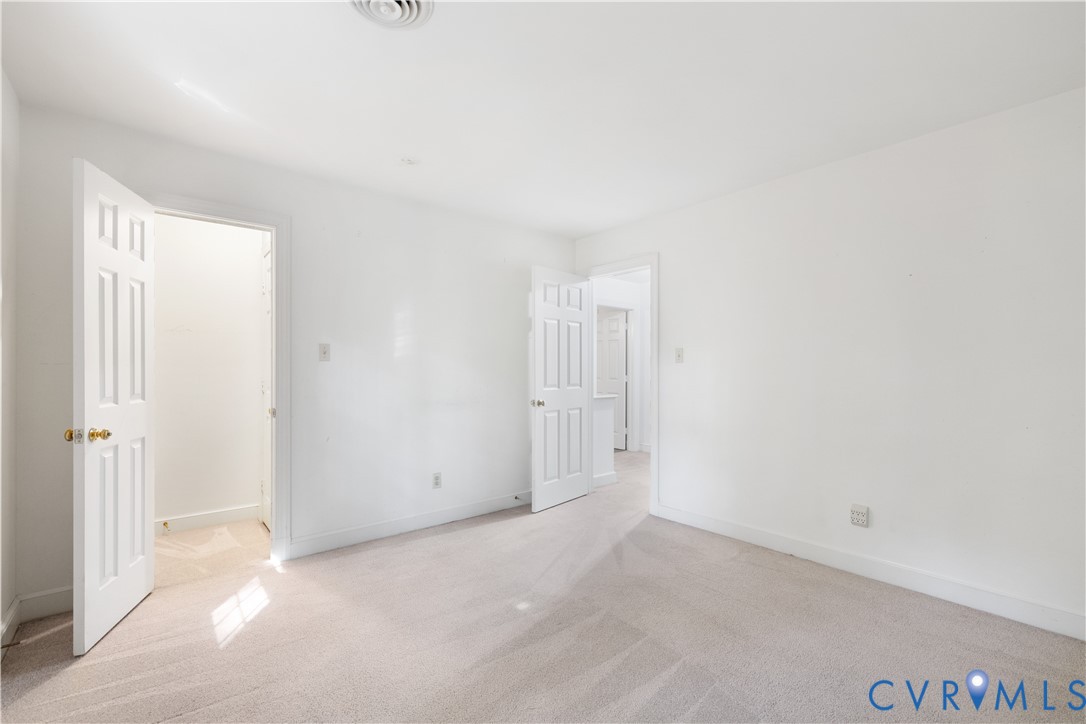 8939 Cardiff Road North Chesterfield, VA 23236 - Photo 31 of 45 Unfurnished bedroom featuring carpet flooring and