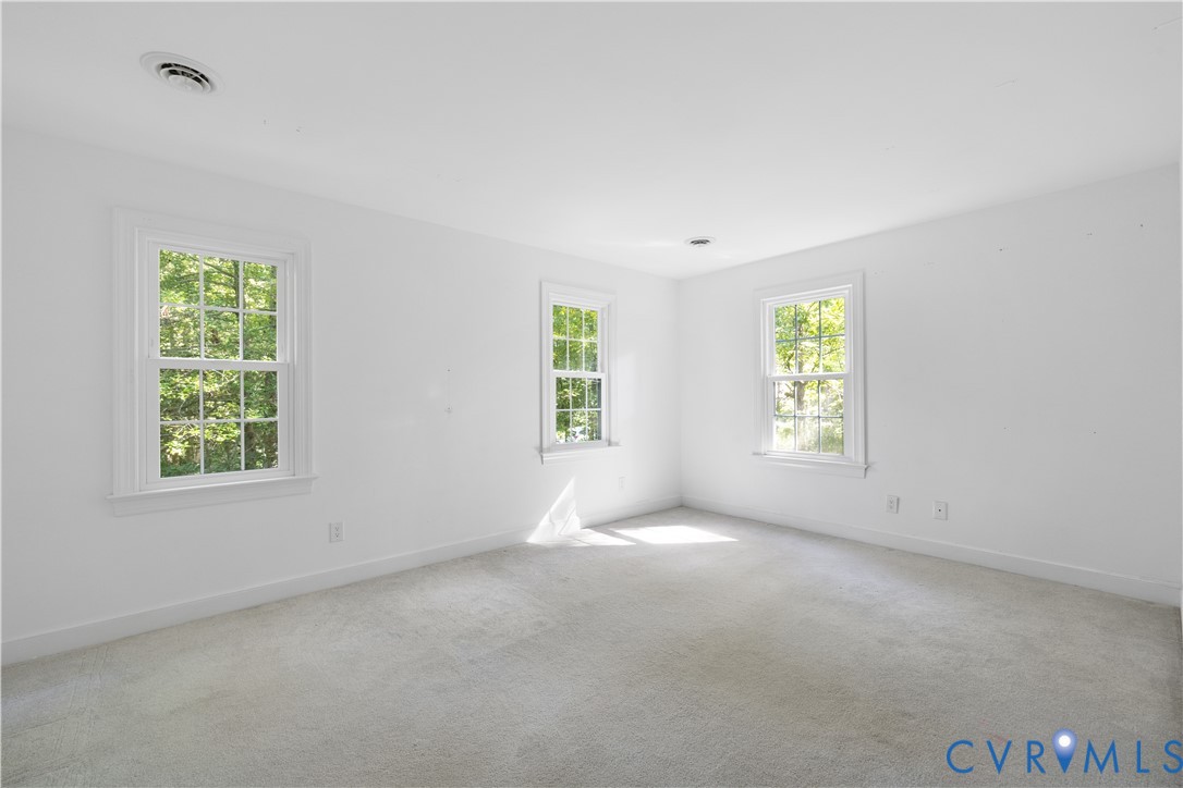 8939 Cardiff Road North Chesterfield, VA 23236 - Photo 32 of 45 Carpeted spare room with baseboards