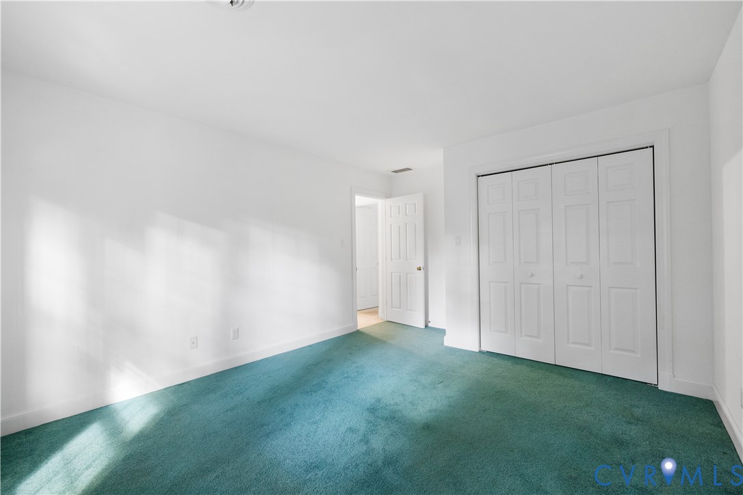 8939 Cardiff Road North Chesterfield, VA 23236 - Photo 35 of 45 Unfurnished bedroom featuring carpet floors and a